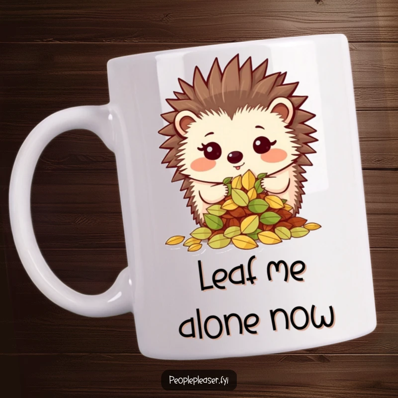 Funny mug featuring a proud hedgehog character showing off a neatly organized pile of leaves, embodying satisfaction and meticulous effort.