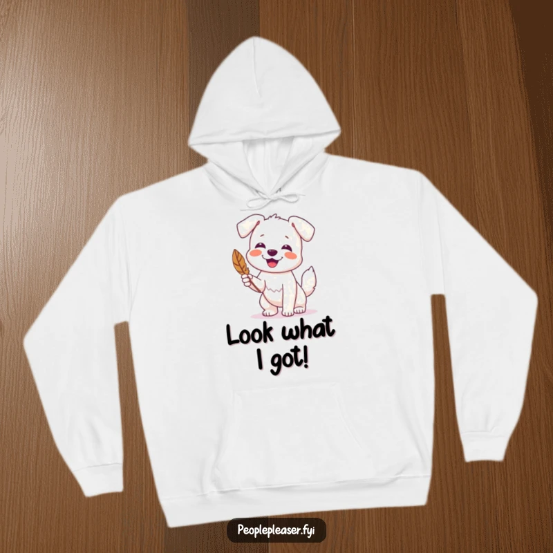 Funny hoodie featuring a happy dog wagging its tail and offering a found feather, perfect for dog lovers.
